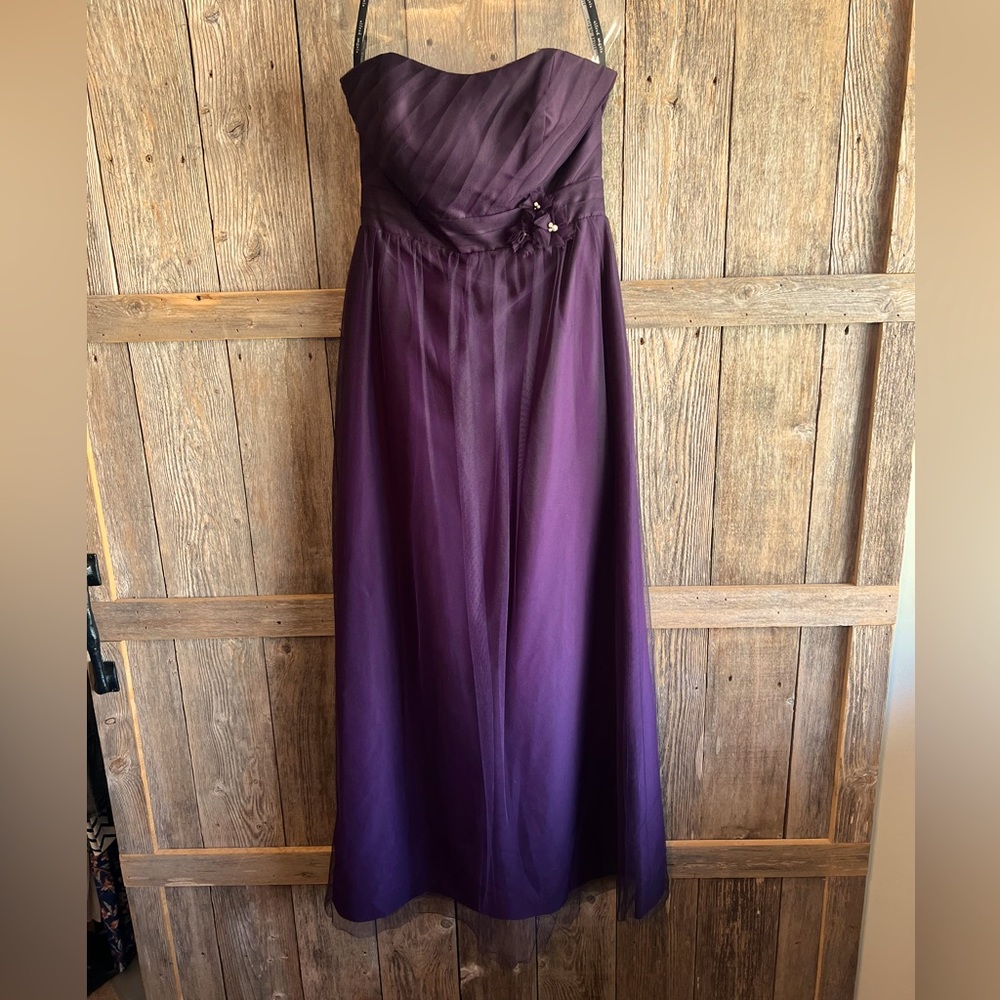 Woman’s strapless formal dress. Bridesmaid, prom, ball